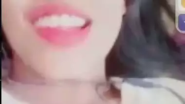 Smiling girlfriend video call to boyfriend shows boobs