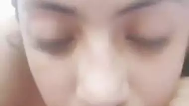 Very cute girl pressing her boobs
