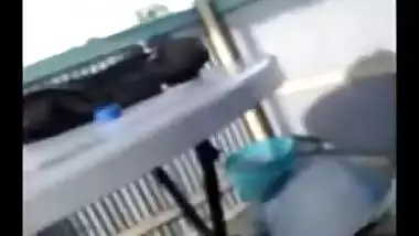 Indian girlfriend gives a blowjob on the balcony.