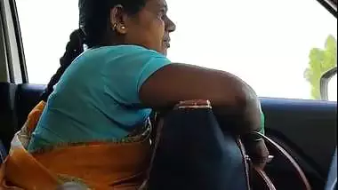 Man shows his dick to a milf in a moving van in Tamil porn