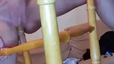 Crazy girl uses chair leg as a sex toy to fuck her pussy