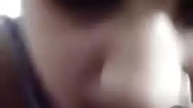 Naughty Desi bhabhi shows tits and fingers her XXX twat on camera