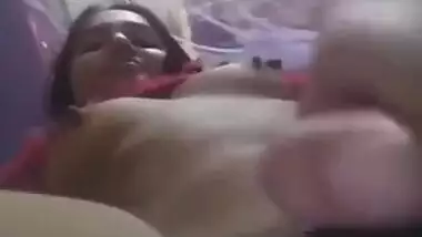 Well-mannered Indian slut lies in bed with naked tits waiting for man