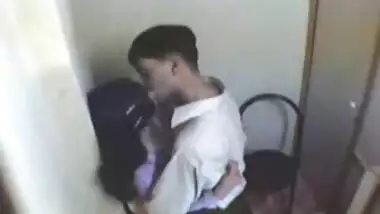 Indian girl having fun with her boyfriend in Internet cafe