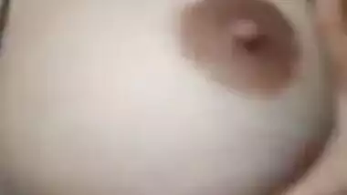 Desi girl makes solo XXX video of herself stripping down under the fan