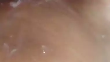 Asian Chick touching herself