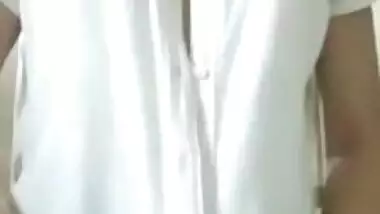 Cute girl removing dress and show boob