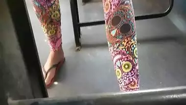 Teen girl feet on public bus