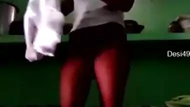 Slender Indian girl shows boobies before putting on clothes