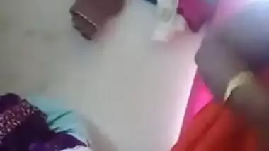 Fatty Indian woman takes off orange dress to join husband for sex