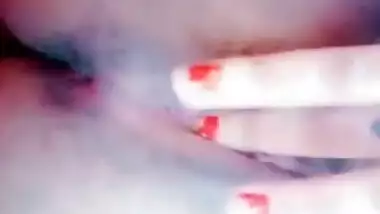 Desi woman enjoys her XXX porn show of naked tits when husband isn't home