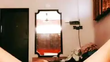 Desi bhabhi with saggy XXX tits inserts an apple into her vagina
