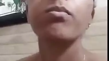 Nude Indian XXX girl smoking and showing her tits and cunt on selfie cam