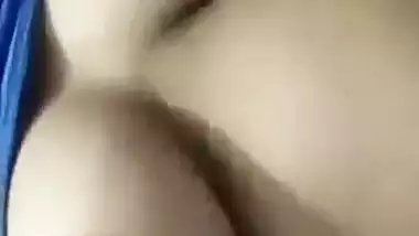Beautiful desi girl lifting top to reveal sexy boobs