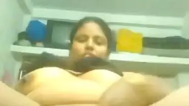 MILF showing big boobs and fingering pussy