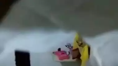 There is a hole in the bathroom and perv films the naked Indian